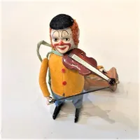 Plåtleksak, Clown med violin, Schuco Solisto, Made in Germany, höjd:11,5cm, uppdragningsnyckel, 1930-tal. Vikt: 0 g