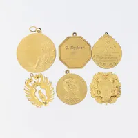 Sex medaljer, förgyllningar, gravyrer, kattfotstämpel, silver  Vikt: 99,4 g