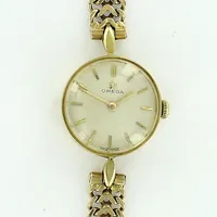 Damur Omega, Ø18mm, manuell, 11057-62, 18K i länk samt ur, gravyr, defekt,  18K. Bruttovikt 20,4g Vikt: 20,4 g
