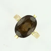 Ring med brun sten, stl 18¾, bredd 3-18mm, 18K, bruttovikt 6,5 g Vikt: 6,5 g