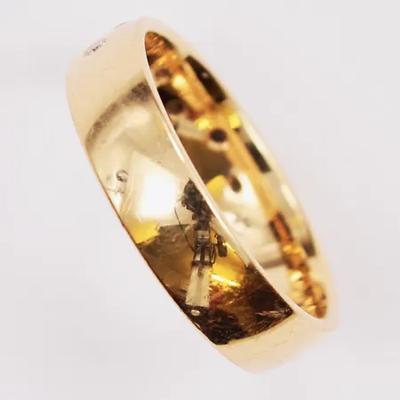 Ring, diamanter 0,13ctv enligt gravyr, Ø17¾, bredd:5mm, Schalin, 18K 5,7g.