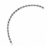 Armband, 19cm, bredd 4mm, med diamanter 46xca 0,02ct, naturliga blå safirer, 14K Vikt: 12,6 g