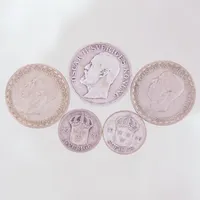 Diverse mynt, 25öre, 1928 60% silver, 1kronor, 1906 80% silver samt 1942 40% silver, silver 400-800/1000 Vikt: 25,8 g