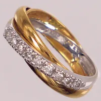 Ring med diamanter 9x ca 0,02ct, totalt 0,15ctv enligt gravyr, stl 15, bredd ca 3,5-4,5mm, tvåfärgad. 18K  Vikt: 2,5 g