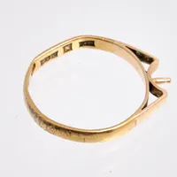 Defekt guld, 23K, vikt 2,36g.