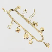 Armband pansar med berlocker 10st,  längd 18,5cm, bredd 3,5mm, säkerhetskedja, Carlson K & E Göteborg 1948, 18k  Vikt: 15,6 g