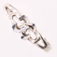 Ring med diamant ca 1x0,02ct 8/8 slipning, stl 16½, bredd 2-5,6mm, vitguld, 18K Vikt: 1,8 g