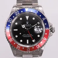 Herrur Rolex Oyster Perpetual GMT-Master, stål, automat, ref-nr: 16700, serie-nr: T682434, kaliber 3175, verk-nr: 7695264, boett-nr: 16700, Ø40mm, 10st Oysterlänkar monterade ref-nr: 78790-Z3, årtal ca 1996, viklås slappt, små repor, inga tillbehör.