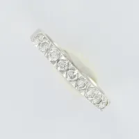 Ring med diamanter, totalt 9 x ca 0,04ct enligt gravyr, stl ca 17, bredd ca 2mm, vitguld, 18K, 3,9g 