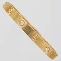 Armband, Cartier Love Bracelet, stl 16, serienummer OIN837, briljantslipade diamanter 4xca 0,10ct, 18K, vikt 29,1g, skruvmejsel, manual, etui, ytterkartong, kvittokopia Cartier Stockholm 2021-11-04.