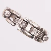  Ring, åttkantslipade diamanter 8xca0,01ct, Ø16½, bredd:2,4-5,8mm, vitguld, 18K. Vikt: 3,8 g
