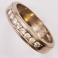 Ring, 8x diamanter 0,24ctv enligt gravyr, Ø16¾, bredd:4mm, gravyr, 18K 4,8g.
