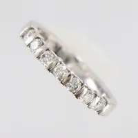 Ring, vitguld, Ø16, bredd 2-3mm, 7 diamanter 0,35ctv, 18K  Vikt: 3,5 g