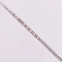 Armband med 5 diamanter ca totalt 0,15ct enligt gravyr, svensk importstämpel, längd ca 18,5cm, bredd ca 3mm, 18K Vikt: 8,4 g