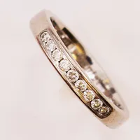 Ring, diamanter 9x 0,18ctv enligt gravyr, Ø16½, bredd:3mm, gravyr, 18K 4,1g.