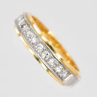 Ring, diamanter 0,23ctv enligt gravyr, stl 15½, graverad, tvåfärgad, 18K Vikt: 4,6 g