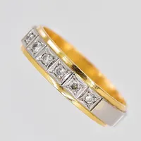 Ring, diamanter 0,12ctv enligt gravyr, bredd 5mm, stl 18½, graverad, tvåfärgad, 18k Vikt: 5,2 g