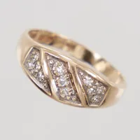 Ring, stl 16¼, diamanter 11x ca 0,01ct, bredd 7,1mm, 18K Vikt: 2,4 g