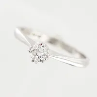 Ring, diamant 0,20ct enligt gravyr, stl 16¾, bredd 2-4,5mm, vitguld, 18K. Vikt: 2,2 g