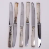 6 knivar, längd 16,7cm, rostfria långa blad, modell Rosenholm, GAB, 1970-tal, repor, 830/1000 silver. Bruttovikt 257,3g Vikt: 257,3 g