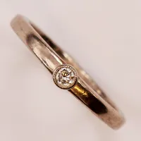Ring, diamant ca 0,05ct, Ø16¼, bredd:3mm, gravyr, 18K 3,3g.