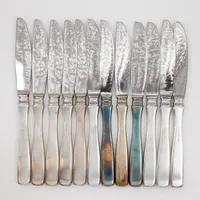 12 Knivar, modell Uppsala, 20,5cm, blad i stål, med linda, MGAB/MEMA Silver 830/1000 bruttovikt 854,1g Vikt: 854,1 g