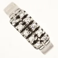 Ring diamanter, 0,20t enligt gravyr, stl 16¼, bredd 5,4mm, gravyr,  Ge-Kå Rolf Kaplan Ab, år 1978, 18K  Vikt: 4,6 g