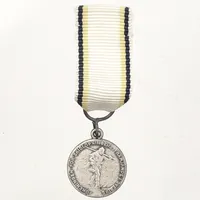 Medalj, Föreningen för skidlöpningens främjande i Sverige, längd ca 6cm, bredd Ø16mm 925/1000 silver,   Vikt: 3 g