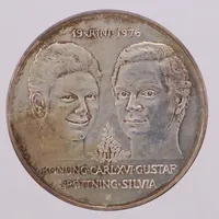 Minnesmynt, Ø36mm, Det Kungliga bröllopet, Konung Carl XVI Gustaf Drottning Silvia -19 Juni 1976, nominellt värde 50kr, 925/1000 silver  Vikt: 26,8 g