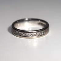 Ring Classic med diamanter 0,12ct, Ø 16¼, bredd 3,8 mm, graverad 18K  Vikt: 4,3 g