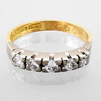 Ring, 18K guld, Diamanter 5 x 0,05ct, tvåfärgad modell, Ceson Guldvaru Ab, Ø15¾ mm, bredd 2,5 - 3 mm, fint skick, borttag av gravyr ingår Vikt: 2,8 g