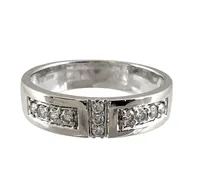 Ring, 18K vitguld, Diamanter 3 x 0,01ct + 8 x 0,02ct, Guldfynd (GHA), Ø16¾ mm, bredd 4,3 mm, fint skick  Vikt: 3,7 g
