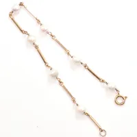 Armband med pärlor, längd ca 20,5cm, bredd ca 5,7mm, slitna pärlor, 18K Vikt: 5,6 g