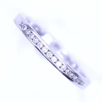 Ring med diamanter totalt 0,08ct, stl 18½, bredd 2mm, gravyr, vitguld, 18K Vikt: 3 g