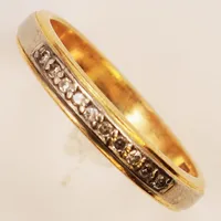 Ring med 8/8-slipade diamanter 10 x ca. 0,01ct, Ø19½, bredd: 4mm, vitguld/gulguld, 18K Vikt: 5,1 g