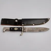 Kniv i stål, 24,5cm, knivblad 13cm,  Puma Solingen, made in Germany, knivslida i läder och hållare för bälte.