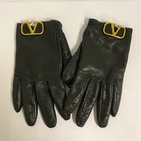 Handskar, Valentino, svart nappaskinn med detaljer i guldfärgad metall, etikettmärkta, stl: 8, bruksskick, fläckar, originalask