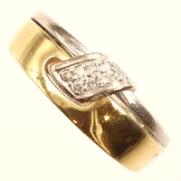 Ring, diamanter, 0,11ct enligt gravyr, tvåtonadd, stl 18¾, bredd 3,6-8,4mm, 18K  Vikt: 6,6 g