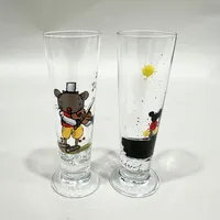 Två snapsglas, Lasse Åberg, glas, höjd 11cm. 