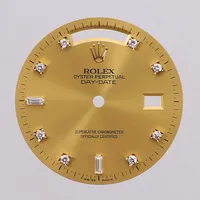 Urtavla Rolex Oyster Perpetual Day-Date med diamantindex briljantslipade diamanter ca 8x0,01ct + baguetteslipade diamanter ca 2x0,01ct, Ø ca 28,5mm, inga tillbehör. 