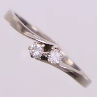 Ring med briljantslipade diamanter ca 0,10ctv, stl 18, bredd 3,7mm, Örns Juvelatelje Göteborg, vitguld 18K Vikt: 2,4 g