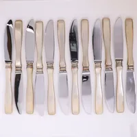 12 Knivar, modell Uppsala, ca 20,5cm, MGAB, fyllda skaft. 830/1000 silver bruttovikt 831,4g 