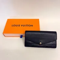 Plånbok Louis Vuitton Sarah Marine Rouge, datumkod CA2167, Made in Spain, mått ca 10x19x2cm, slitage på gulmetall och lädret, skadad dustbag, kartong