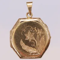 Medaljong 24x34, tillverkad av klockboett, dekor av blomma, bucklig, 14K Vikt: 5,1 g