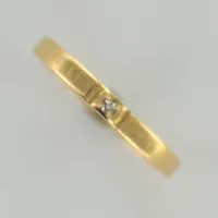 Ring med diamant ca 0,01ct stl 16½, bredd 2mm, 18K   Vikt: 2 g