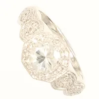 Ring, diamanter 0,15ct enligt gravyr, stl 19, bredd 10,5mm, vita stenar, 14K  Vikt: 4,4 g