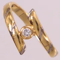 Ring med diamant 1xca0,10ct enligt gravyr, stl 18, bredd: 2,6-13,2mm, Heribert Engelbert AB, år: 1989, detaljer i vitguld, 18K Vikt: 3,6 g