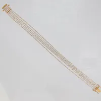 Armband, femradigt med vita stenar, 17,5cm, bredd: 8mm, 18K Vikt: 25,6 g