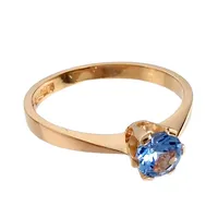 Ring, 18K guld, ljusblå Spinell Ø 5 mm, Svedboms Guldsmeds Ab (ESM), svensk kontrollstämpel, Ø17½ mm, bredd 2 - 5,5 mm, mycket fint skick Vikt: 2,5 g