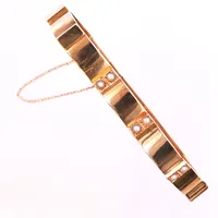 Armband med orientaliska pärlor, Guldvaruaktiebolaget G. Dahlgren & Co Ab 1910, längd ca 18,4cm, bredd ca 8mm, med säkerhetskedja, ihåligt, 18K Vikt: 22,9 g